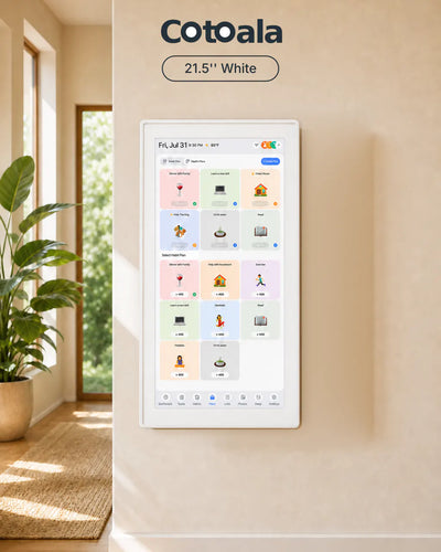 Cotoala 21.5-inch white smart wall display mounted in a warm, sunlit home interior.