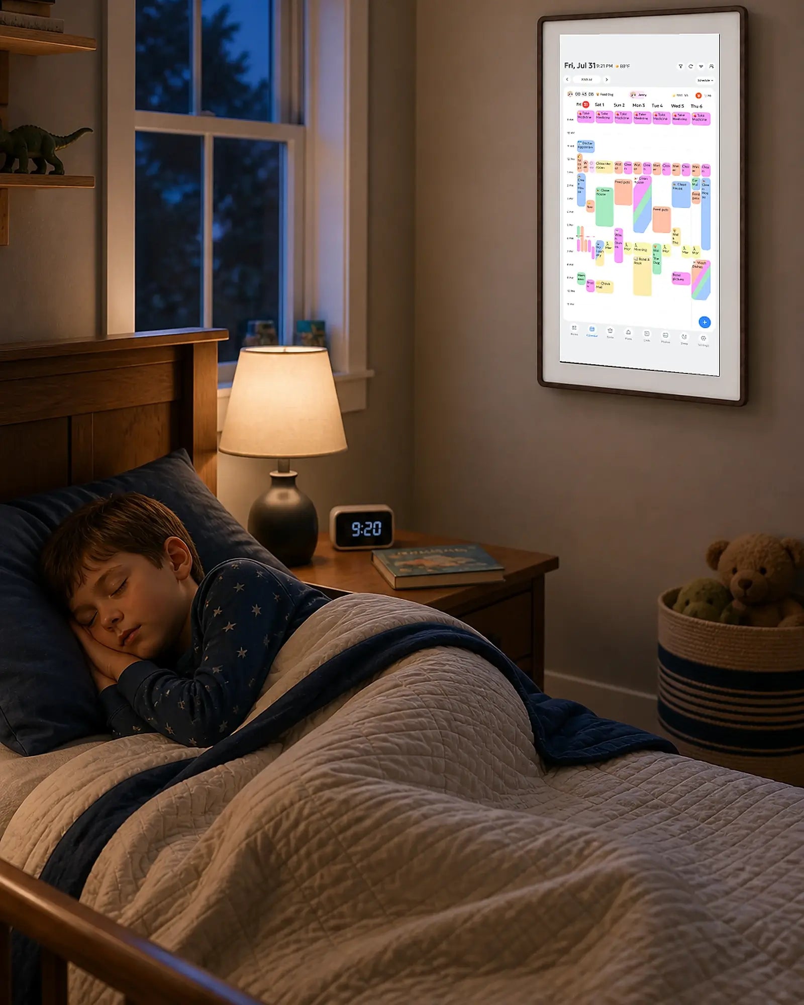 A child sleeps while a wall-mounted smart family calendar displays the weekly schedule